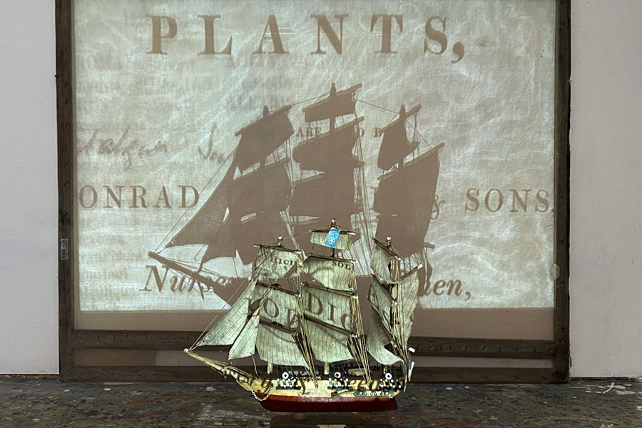 decoartive ship infront of a projection