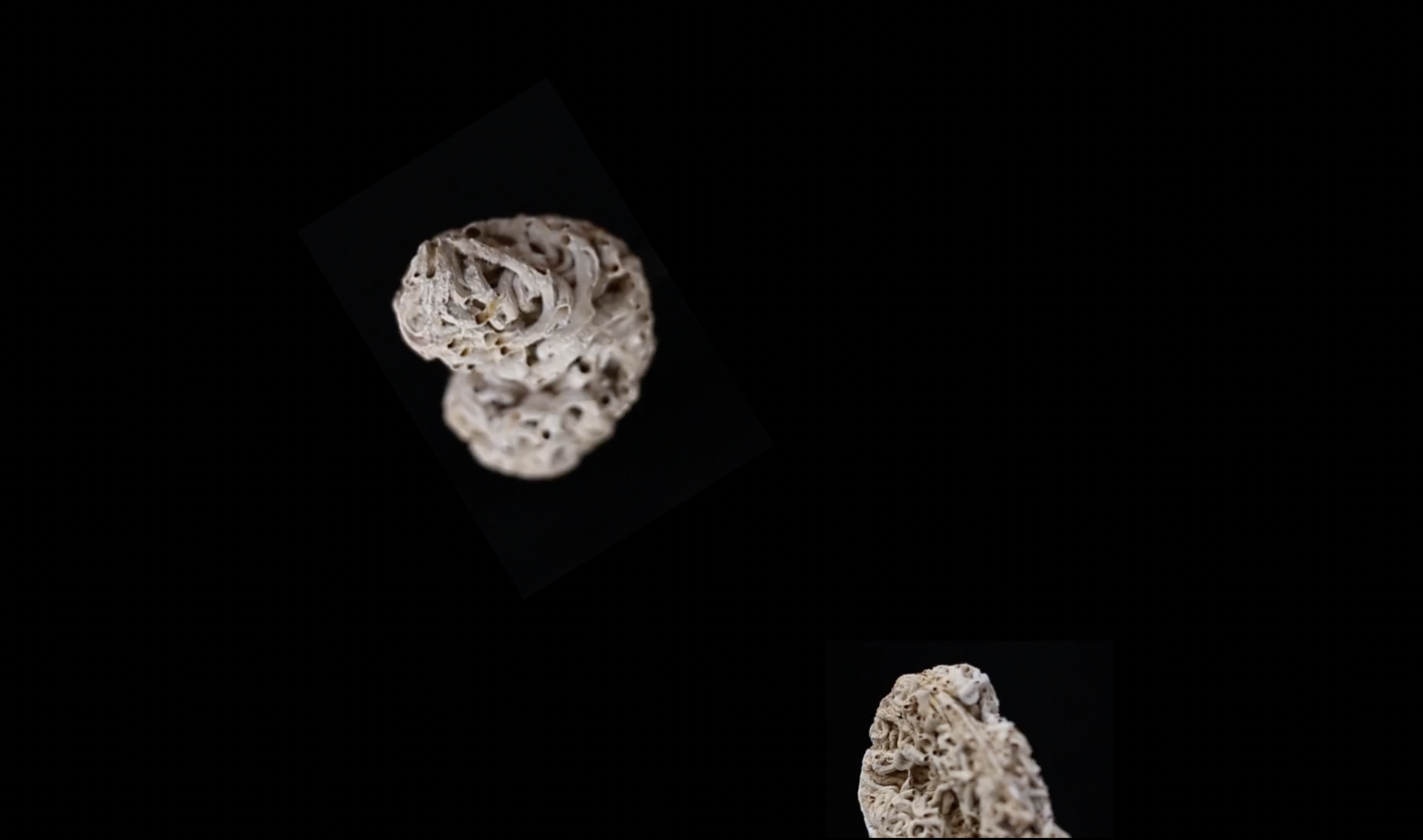 rocks falling on a black background